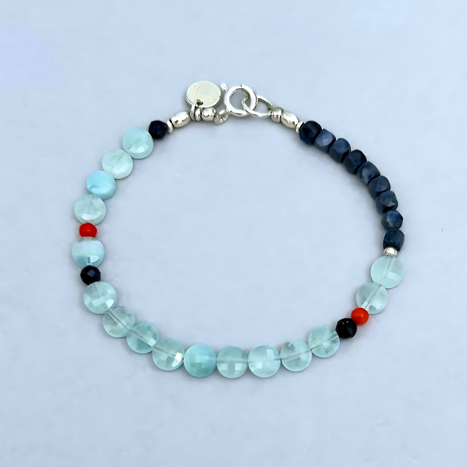 This LeBijouBijou Perfect Match Bracelet is a made with a combination of aquamarines and sapphires. 